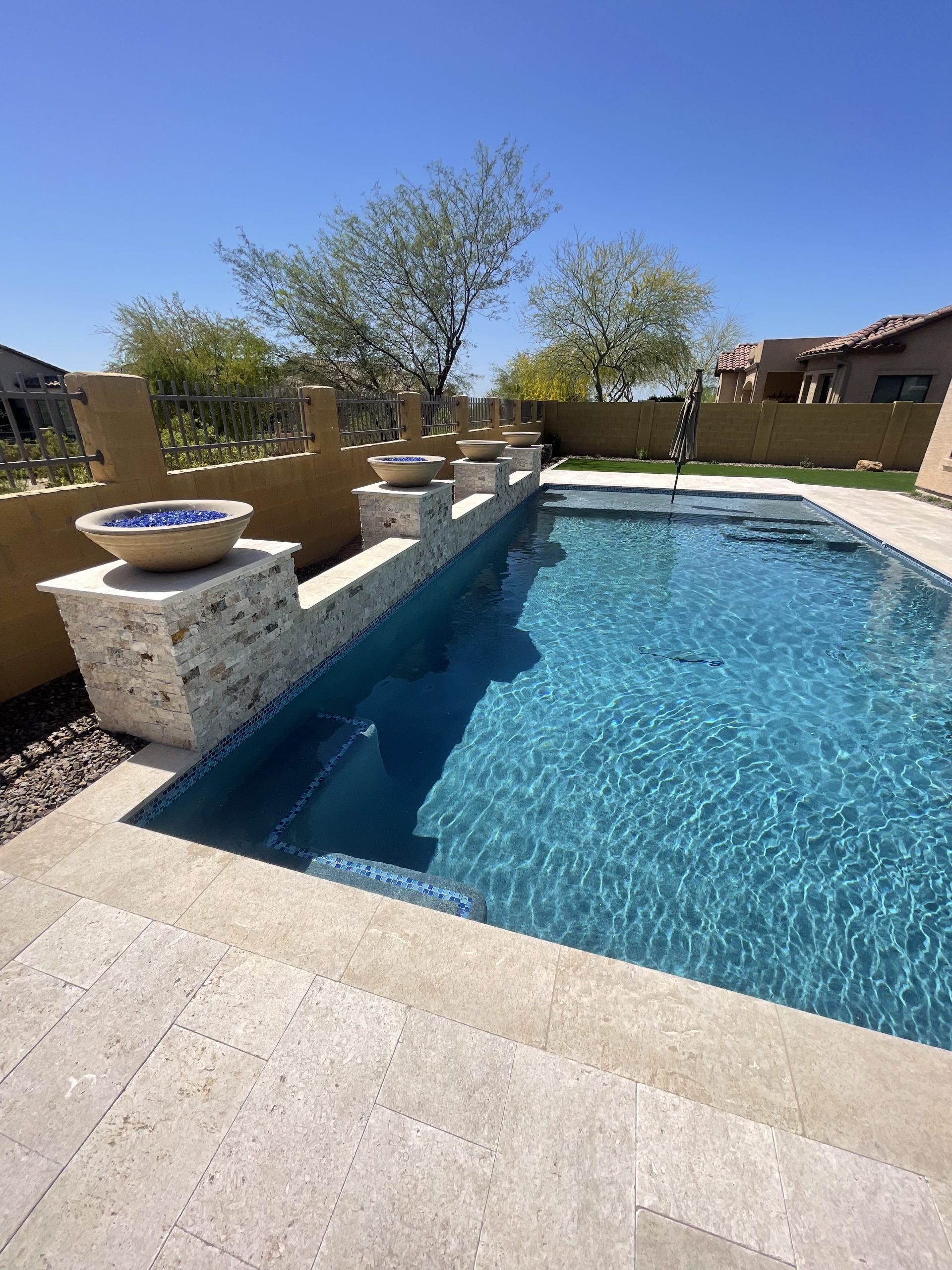 Custom geometric pool and spa in Phoenix by AZ Pool Concepts